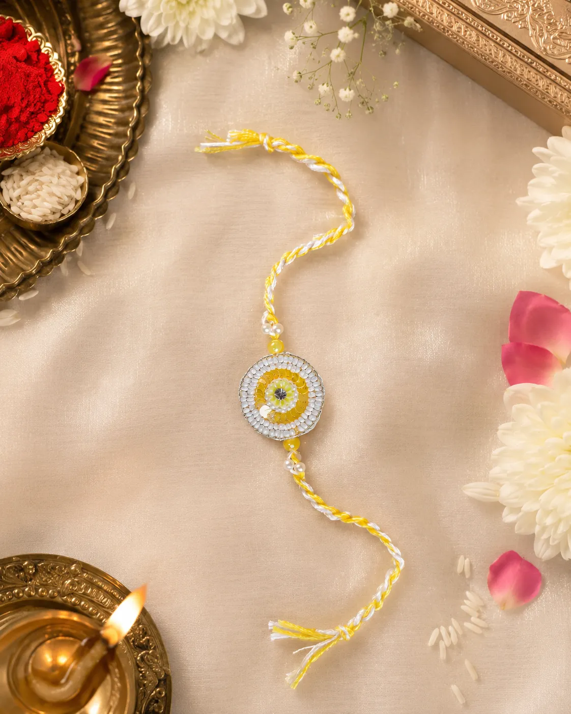 Yellow circular stone rakhi